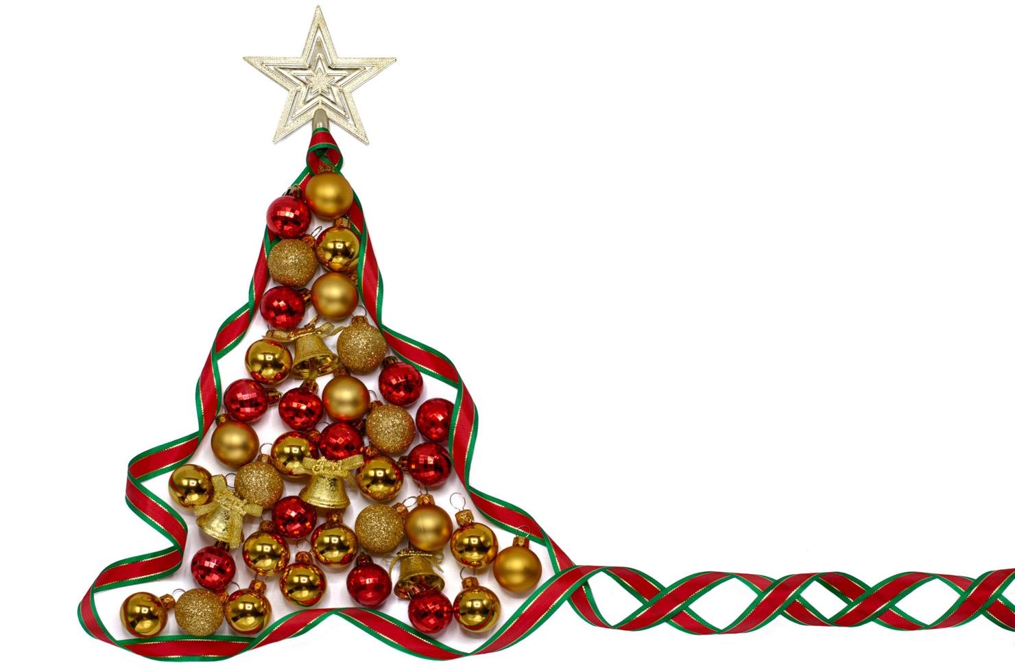 Christmas tree made from green and red color ribbon with star ornament on the top and colorful baubles isolated on white color background. photo