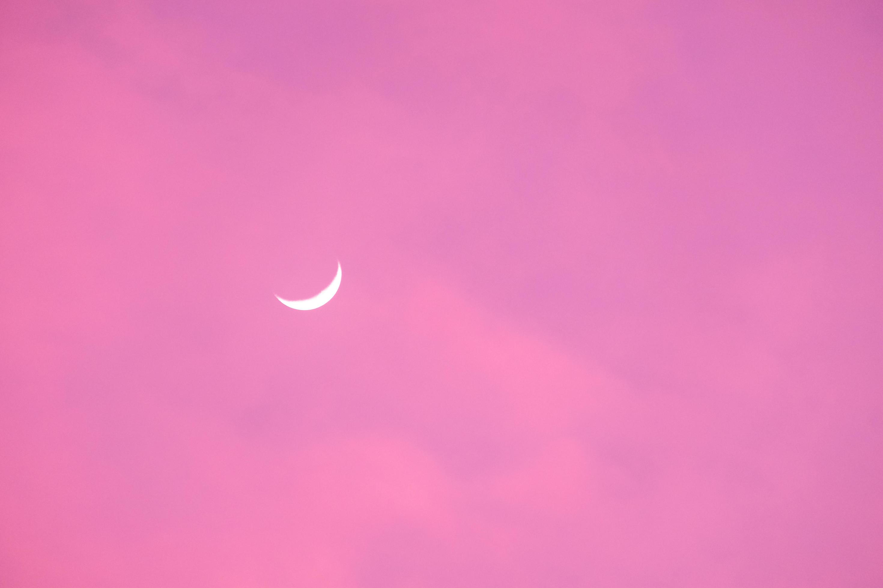 Half Moon in the morning on pink sky 12899871 Stock Photo at Vecteezy