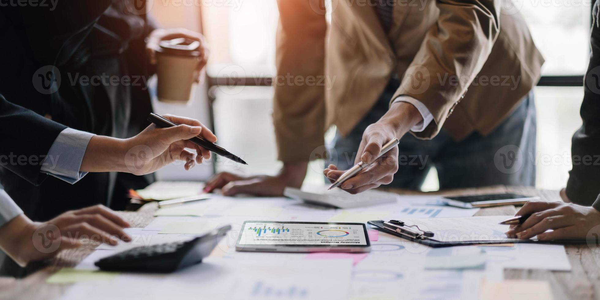 Business team collaboration discussing working analyzing with financial data and marketing growth report graph in team, presentation and brainstorming to strategy planning making profit of company. photo