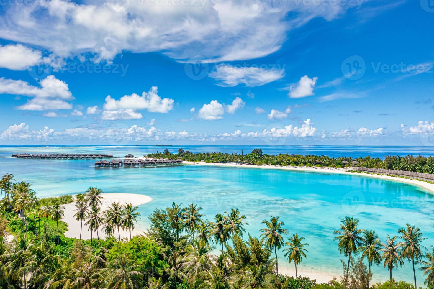 Sea beach aerial. Luxury summer travel vacation landscape. Tropical beach, drone view. Beach villas bungalows of hotel resort. Perfect beach scene vacation, summer holiday template. Wonderful nature photo