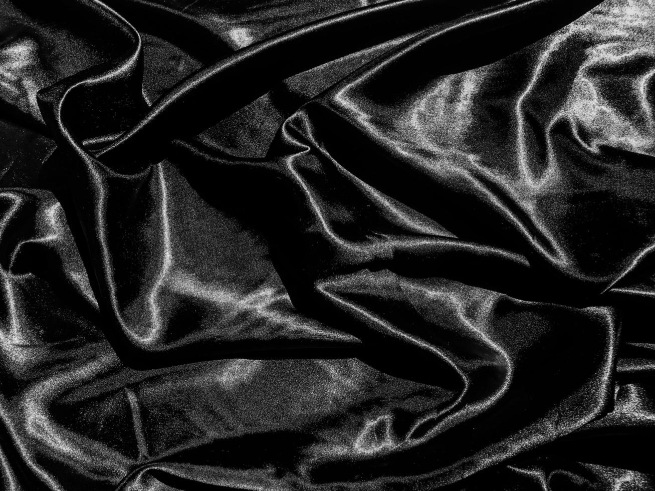 Black satin texture background with liquid wave or wavy folds. Wallpaper  design 12902809 Stock Photo at Vecteezy