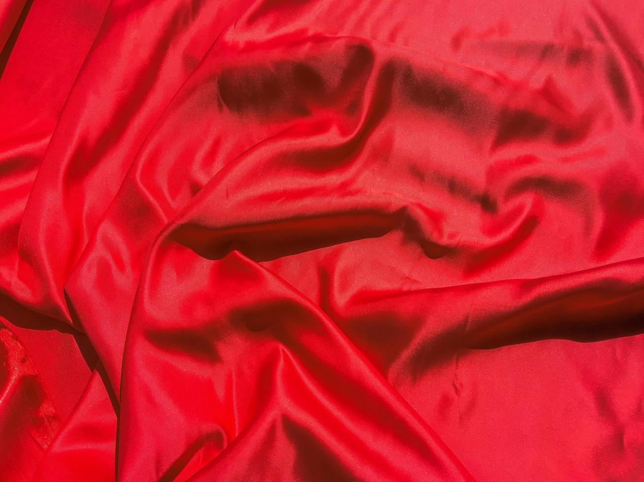 Red fabric texture for backgroundwith coy space. Valentines Day or Christmas Day wallpaper design photo