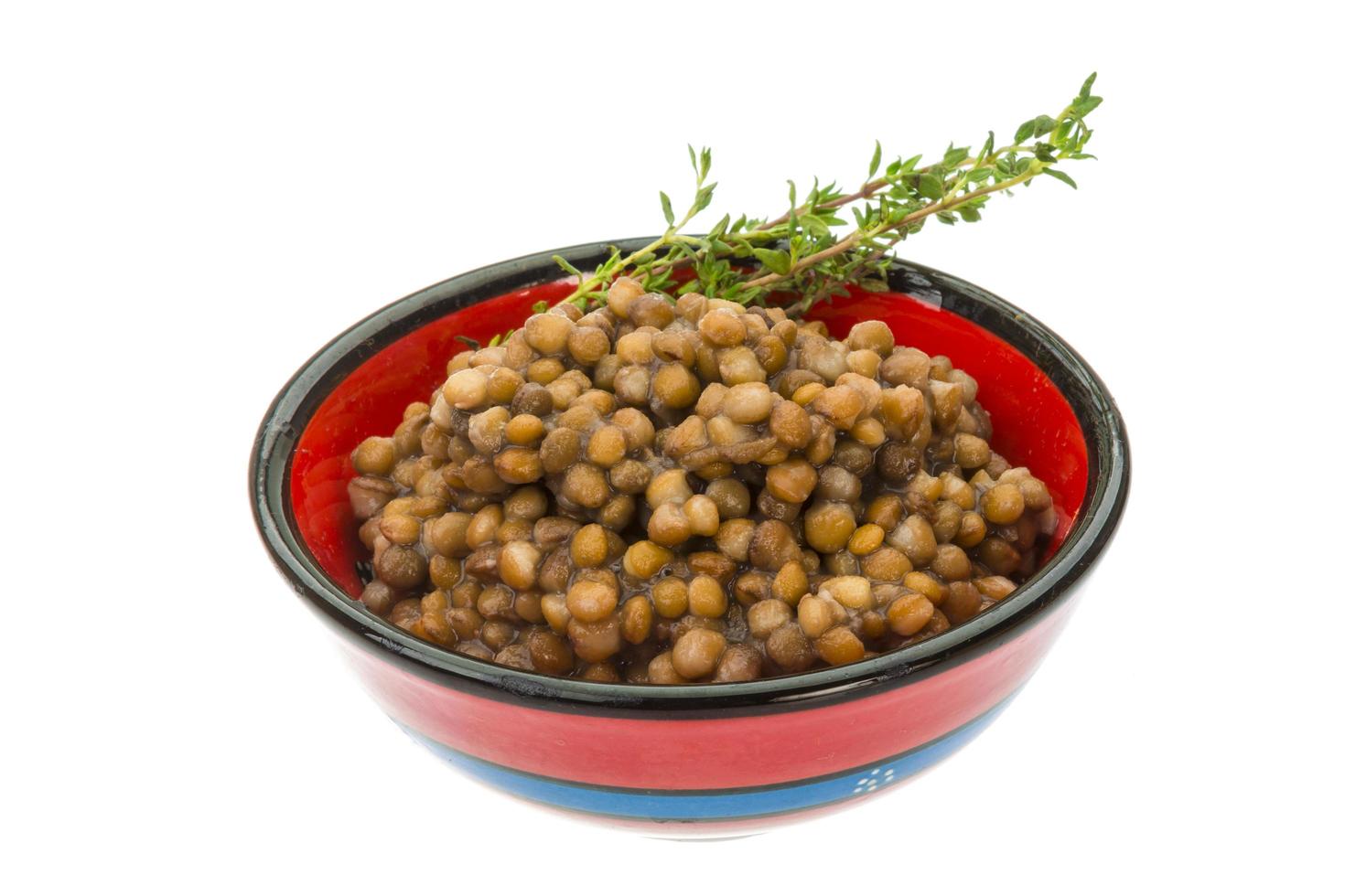 Baked lentil on white photo