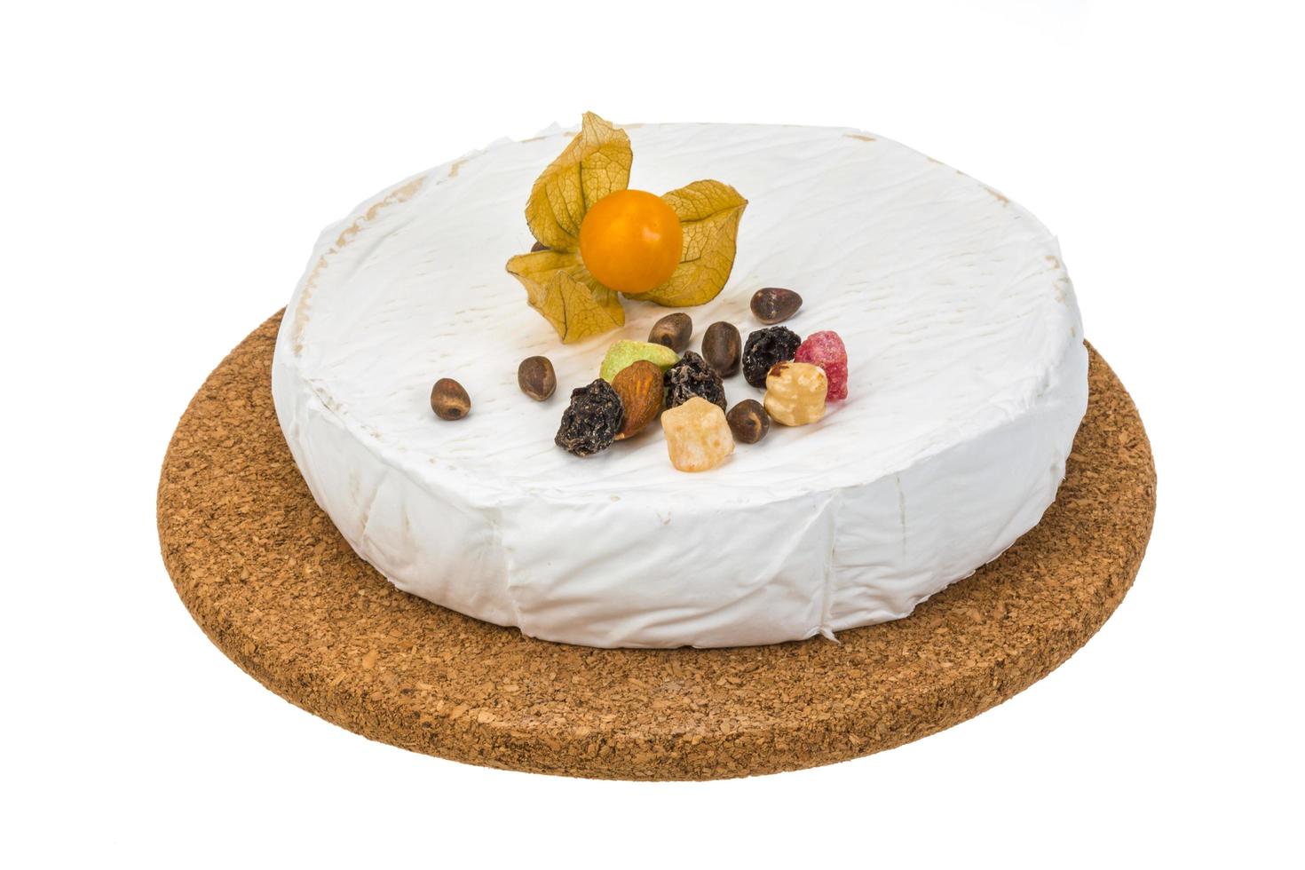 Brie cheese on white photo