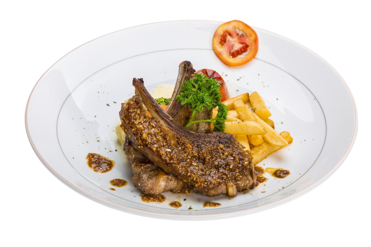 Lamb chops on white photo