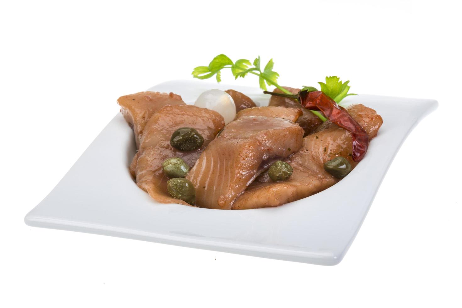 Sliced herring on white photo