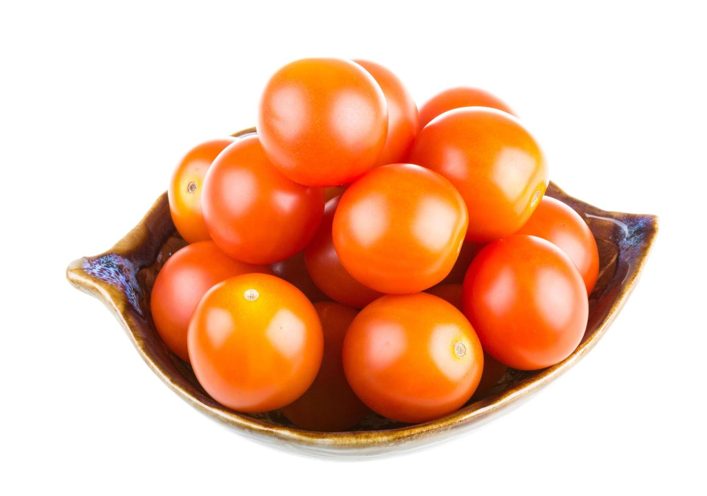 Cherry tomatoes on white photo