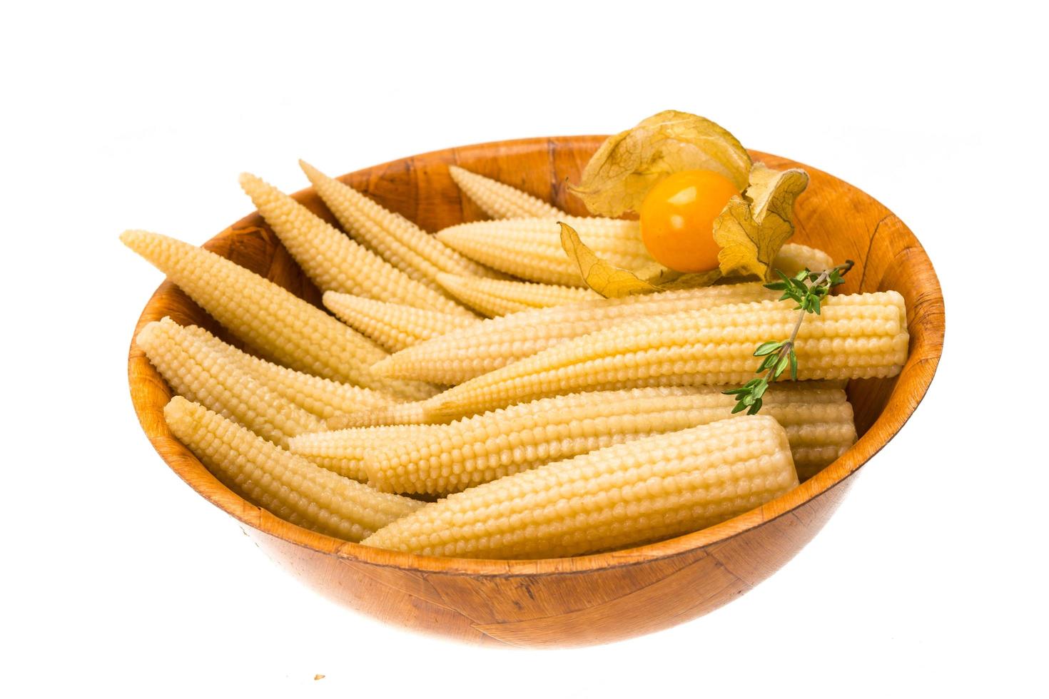 Baby corn on white photo