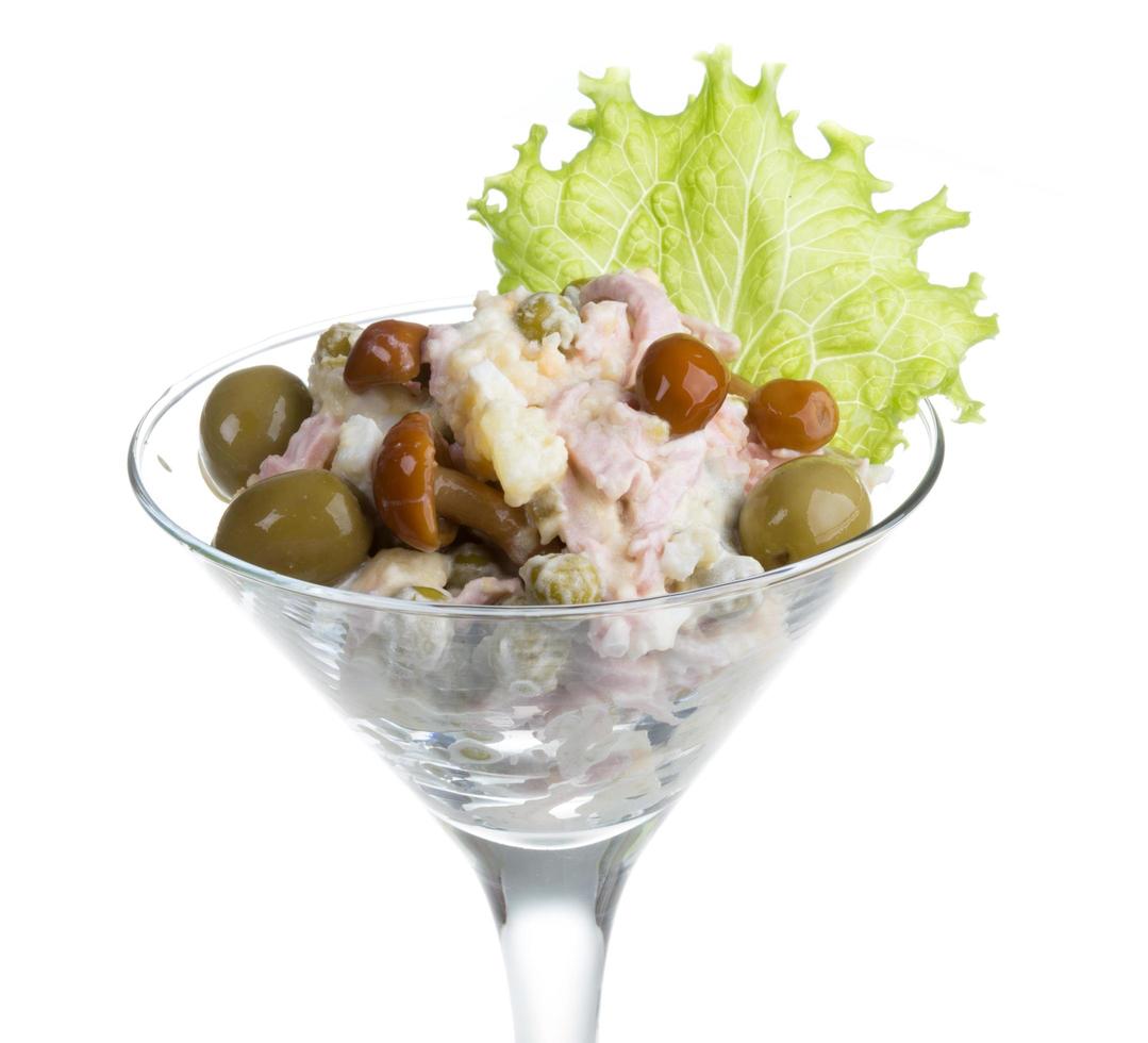 Russian salad on white photo