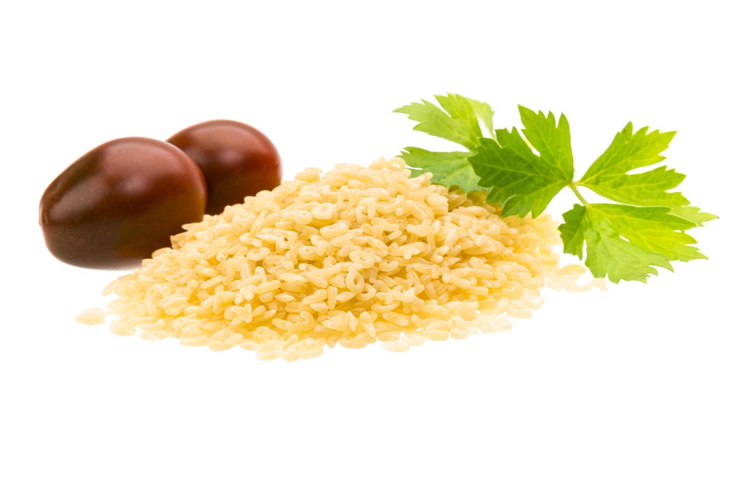 Raw macaroni on white photo