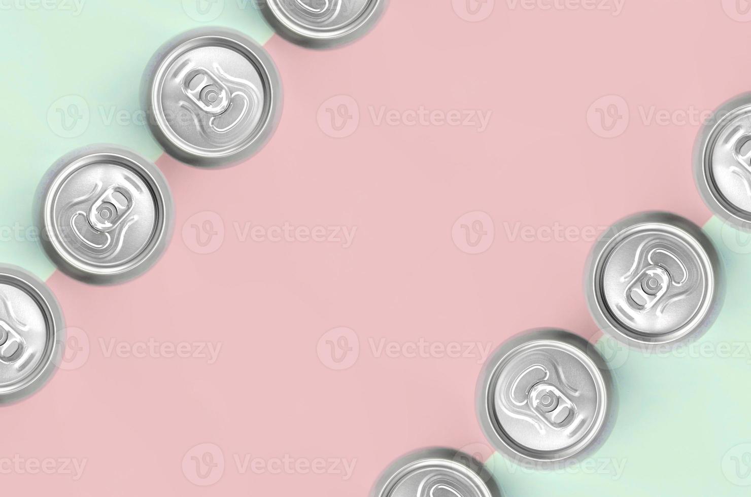 Many metallic beer cans on texture background of fashion pastel turquoise and pink colors photo