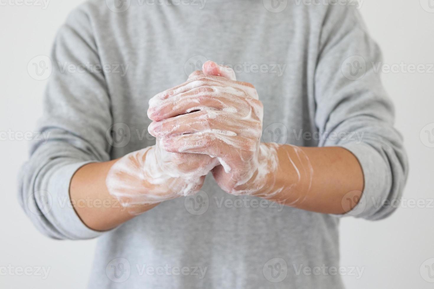 Man wash hands with soap for COVID-19 corona virus prevention concept photo