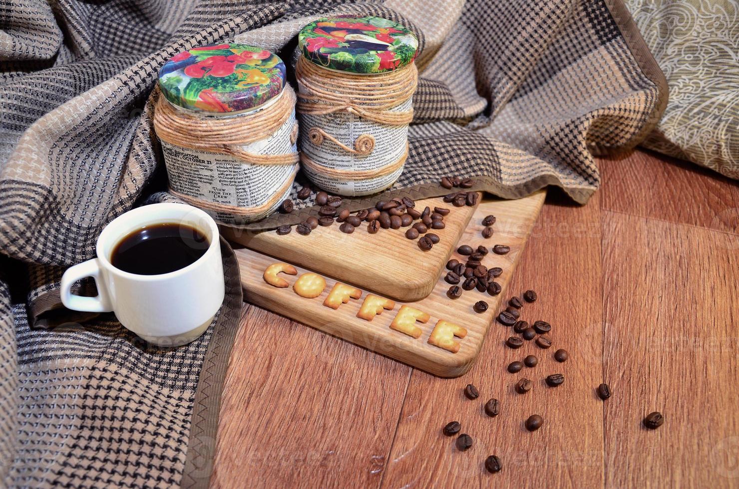 Coffee cup and a text, composed of crackers photo