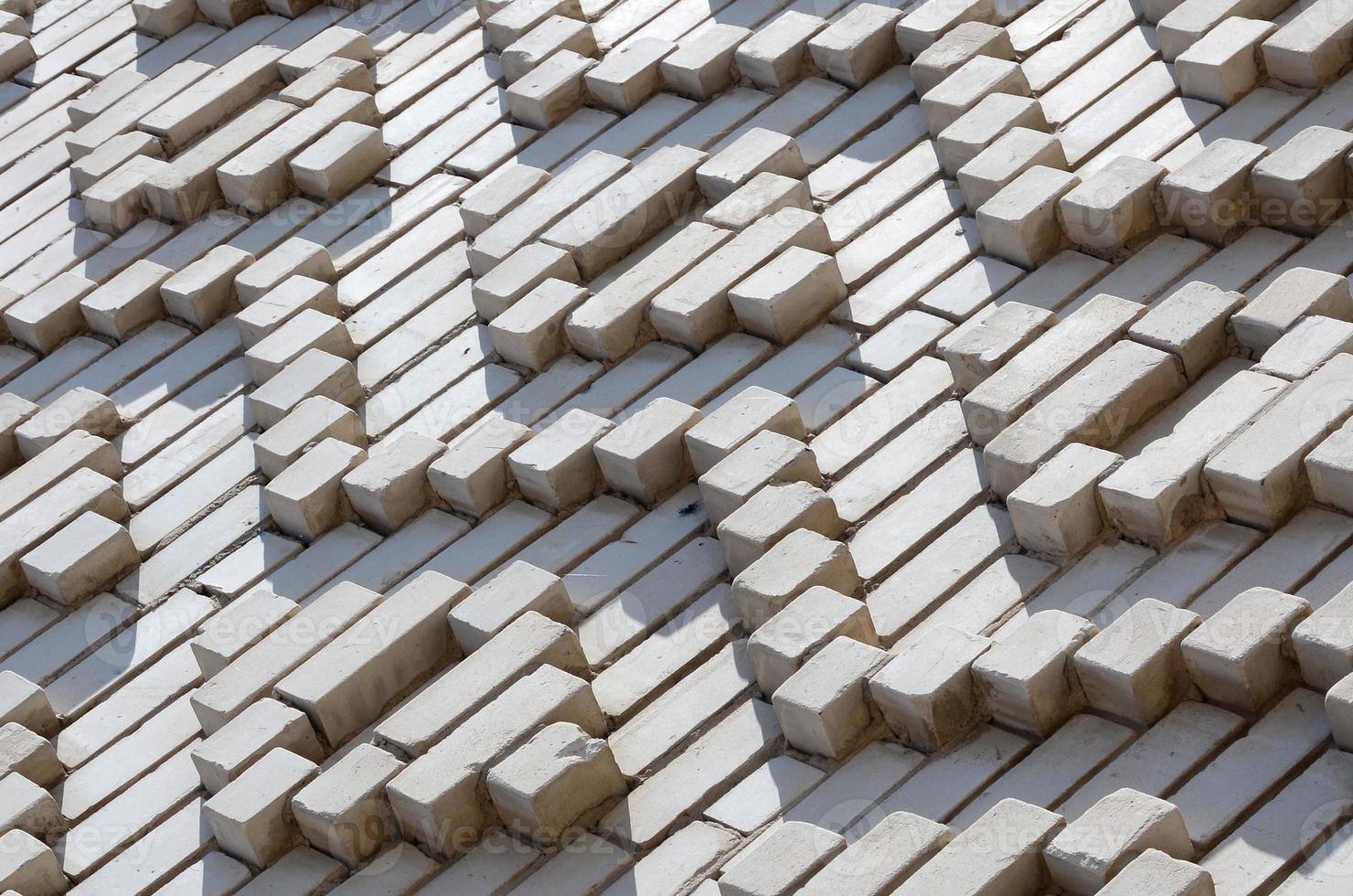 A pattern made of white bricks in the form of diamond shapes. Decoration of the walls during the Soviet Union photo