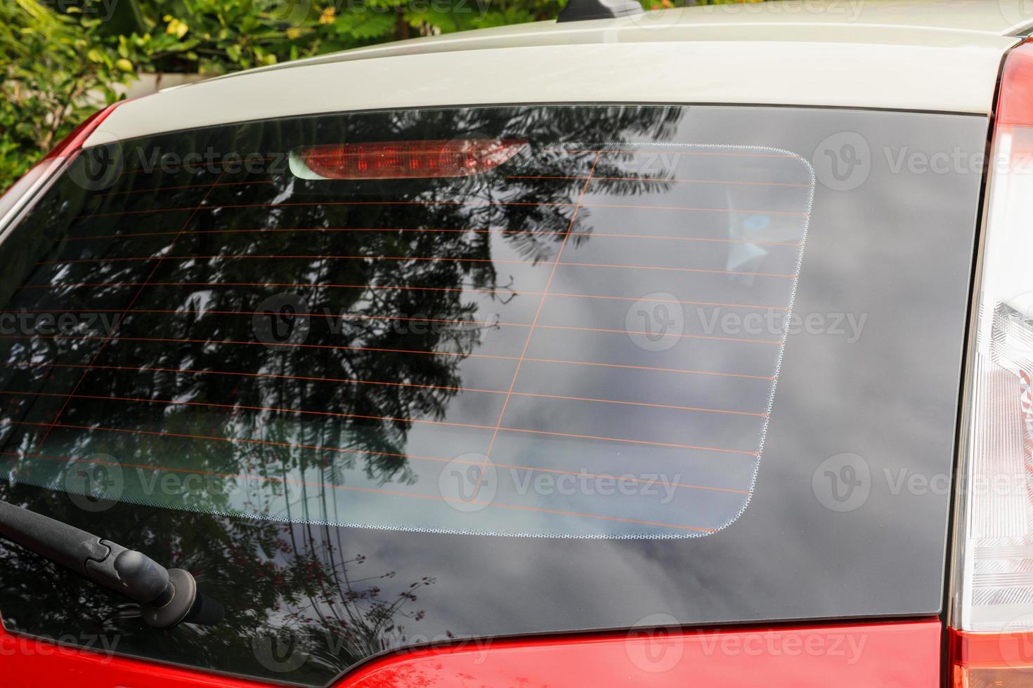 Back view of red car window for sticker mockup photo