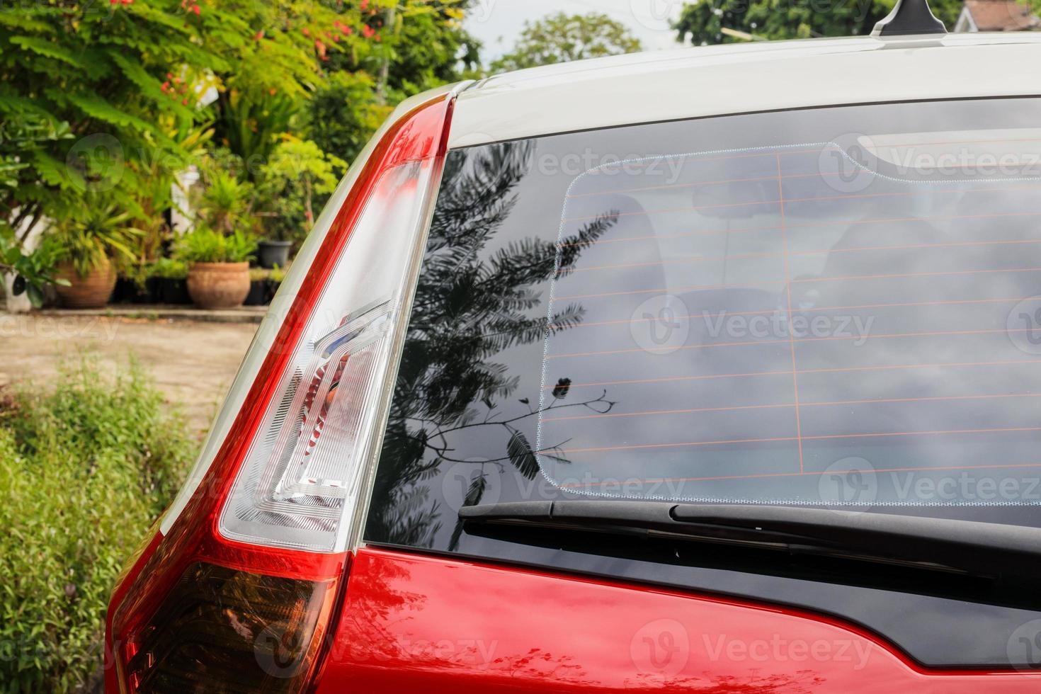 Back view of red car window for sticker mockup photo