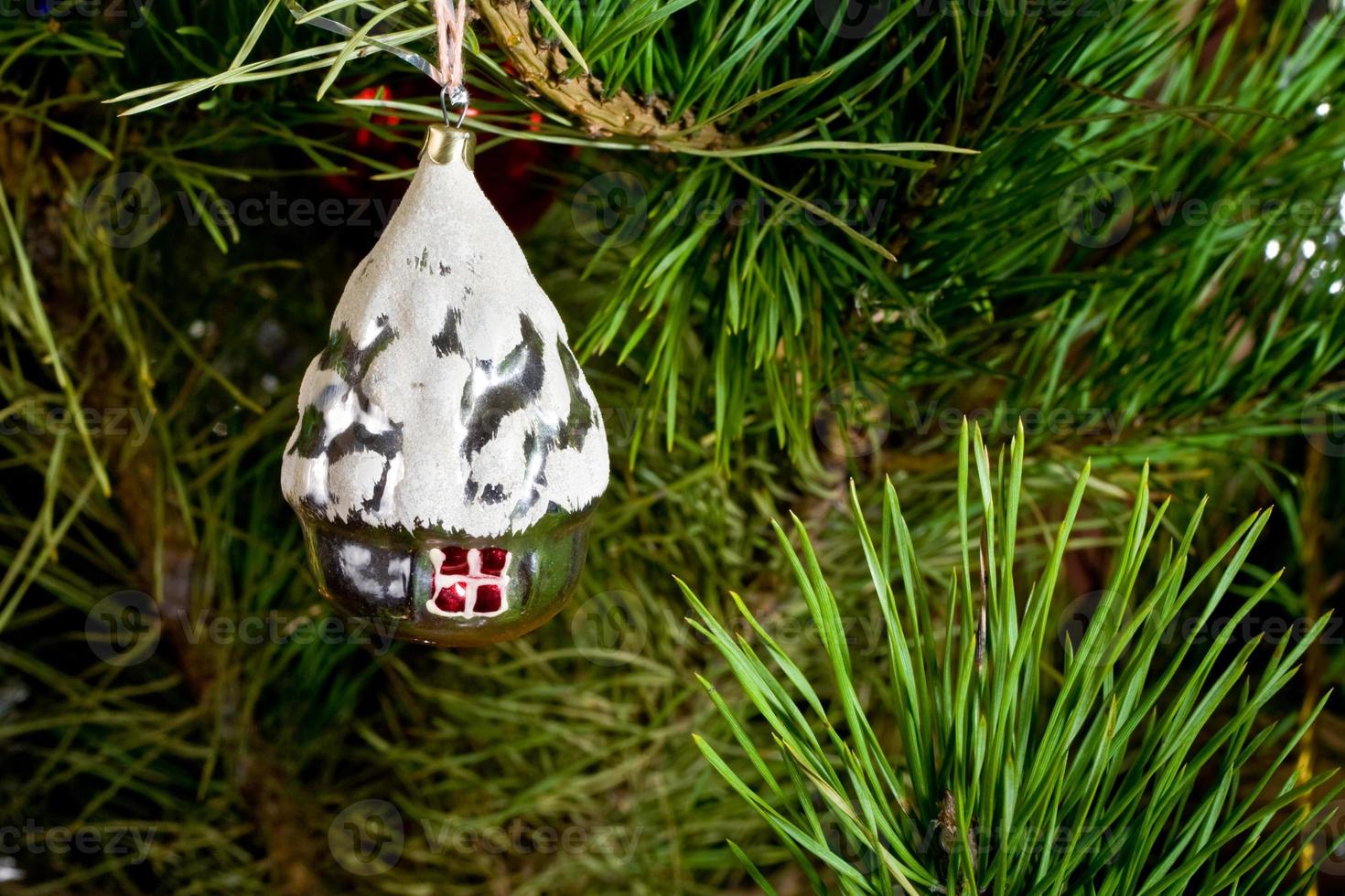 Christmas-tree decorations on tree photo