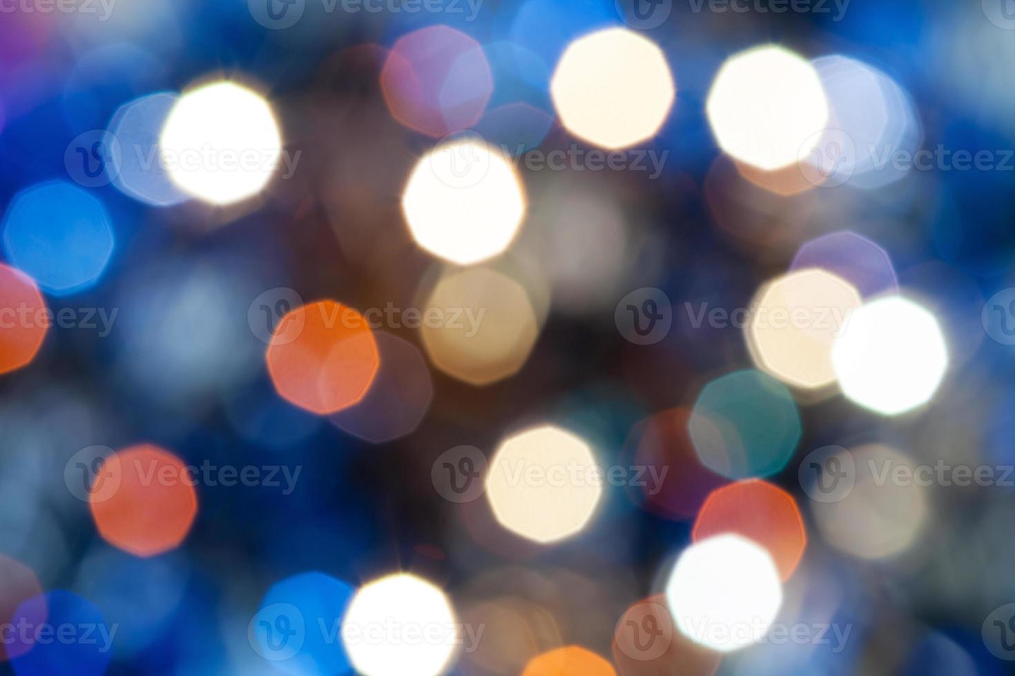 luces de navidad brillantes borrosas azules foto