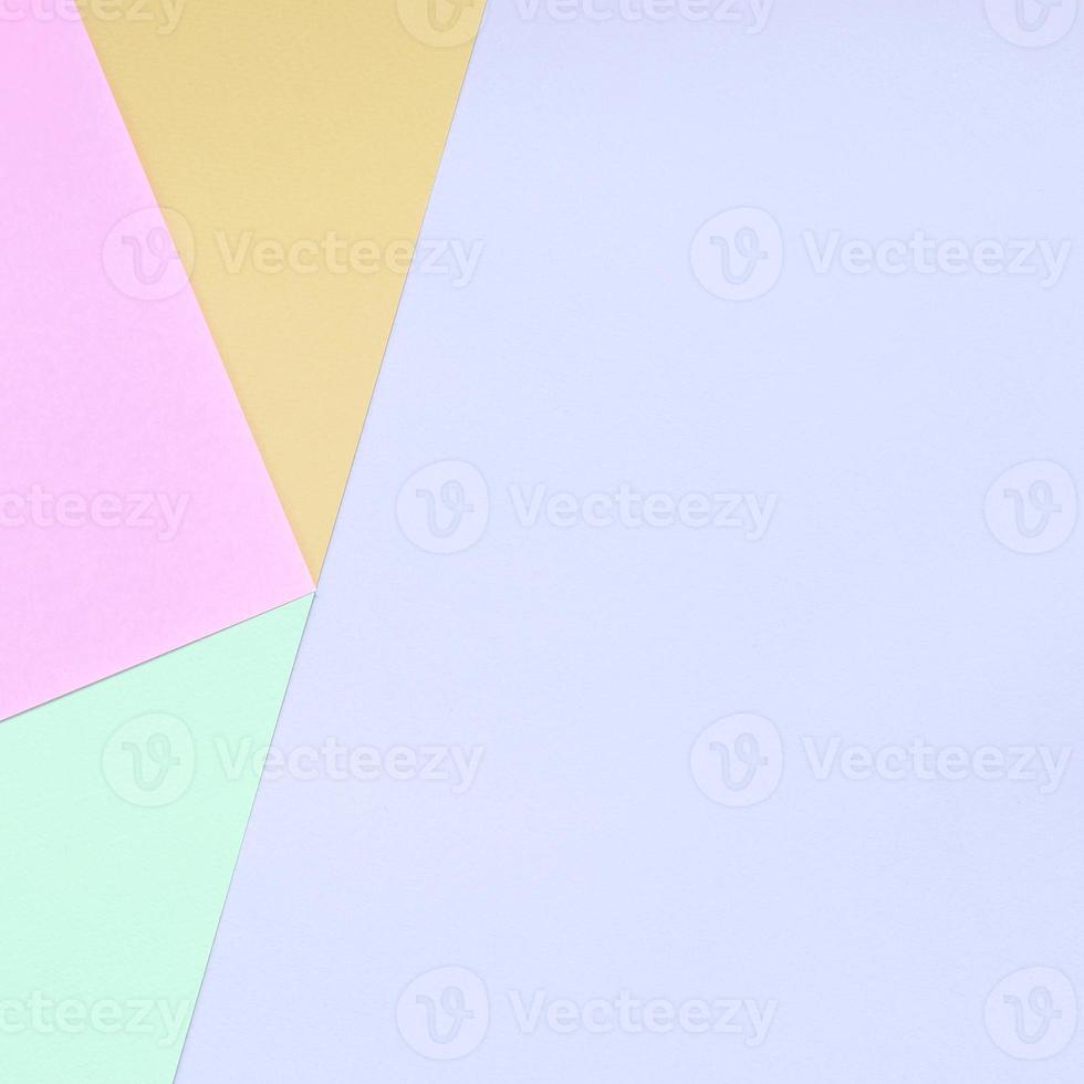 Texture background of fashion pastel colors. Pink, violet, orange and blue geometric pattern papers. photo