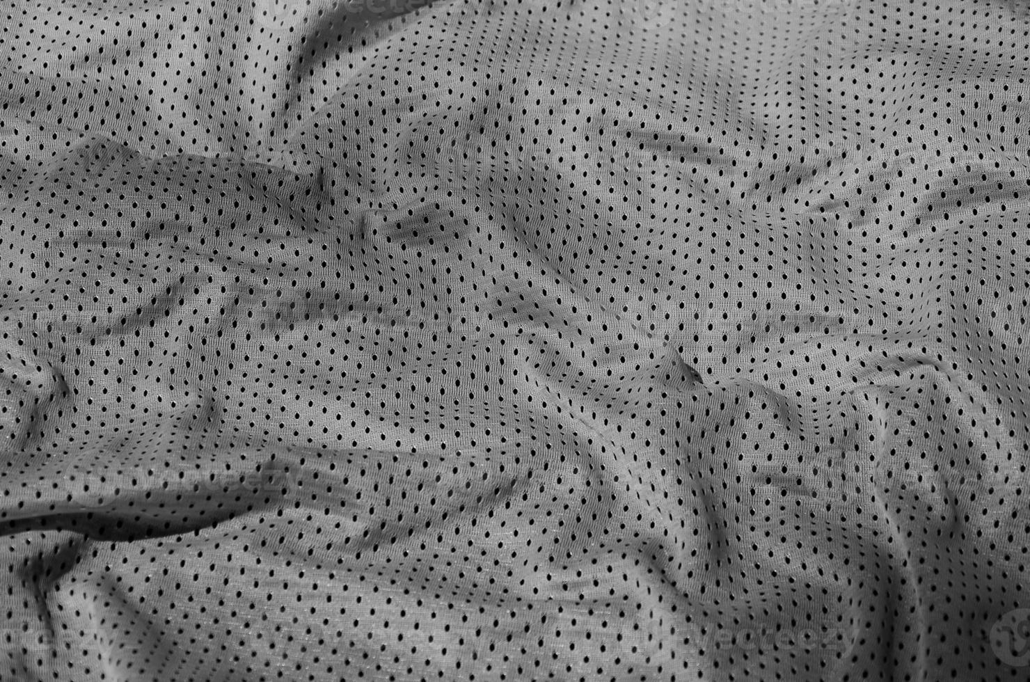 Sport clothing fabric texture background, top view of grey cloth textile surface photo