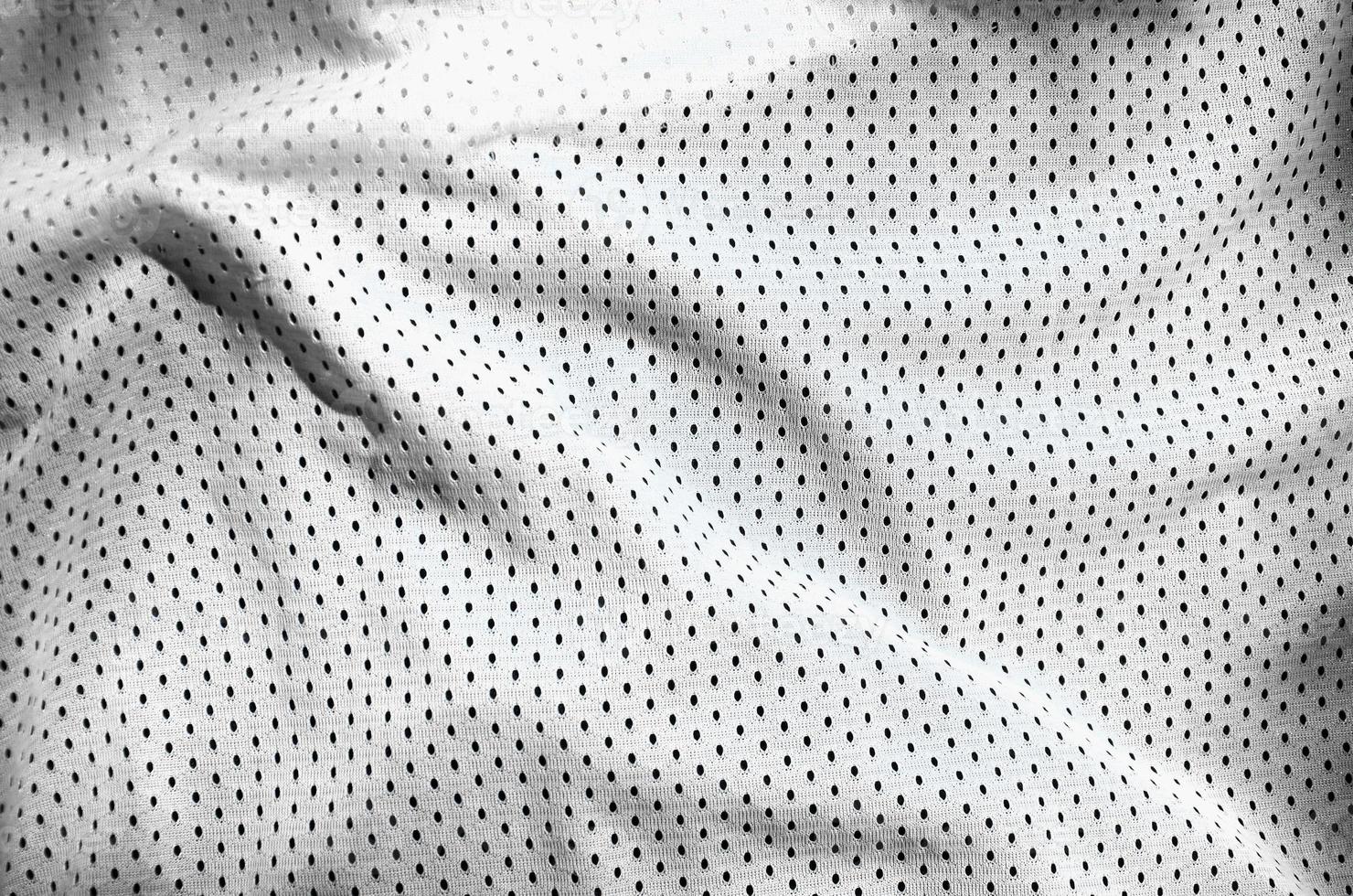 Close up of white polyester nylon sportswear shorts to created a textured background photo