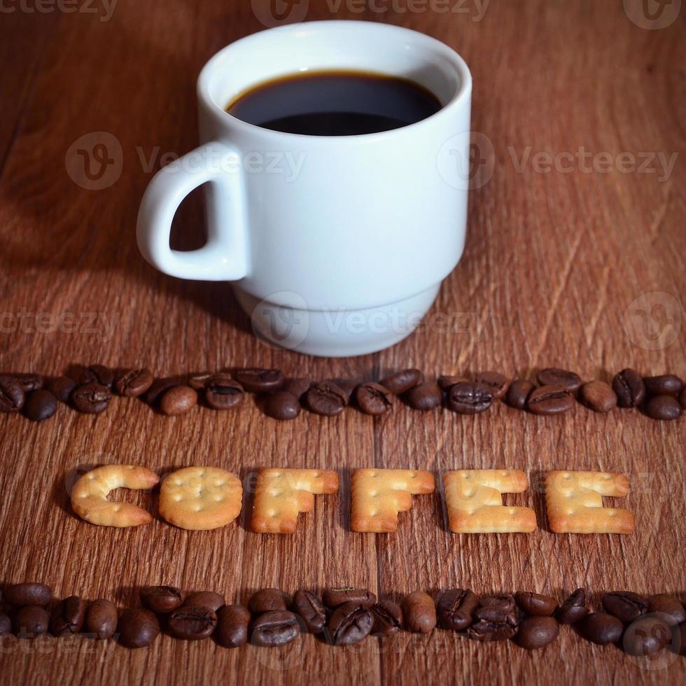 English word Coffee, made up of salt cracker letters photo