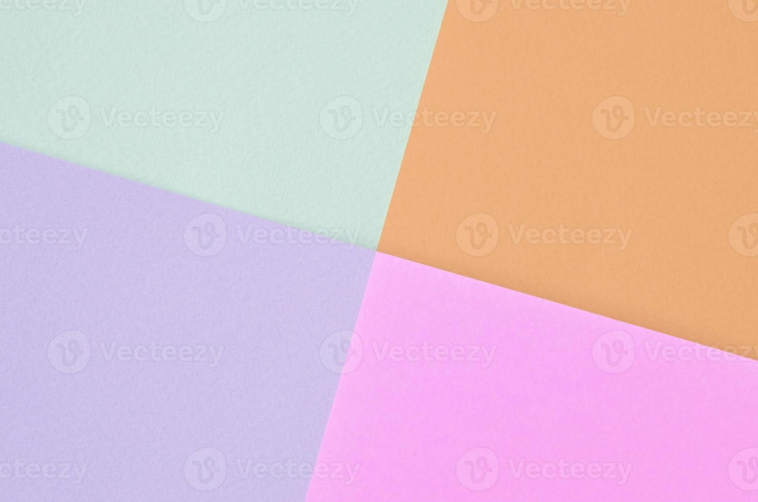 Texture background of fashion pastel colors. Pink, violet, orange and blue geometric pattern papers. photo