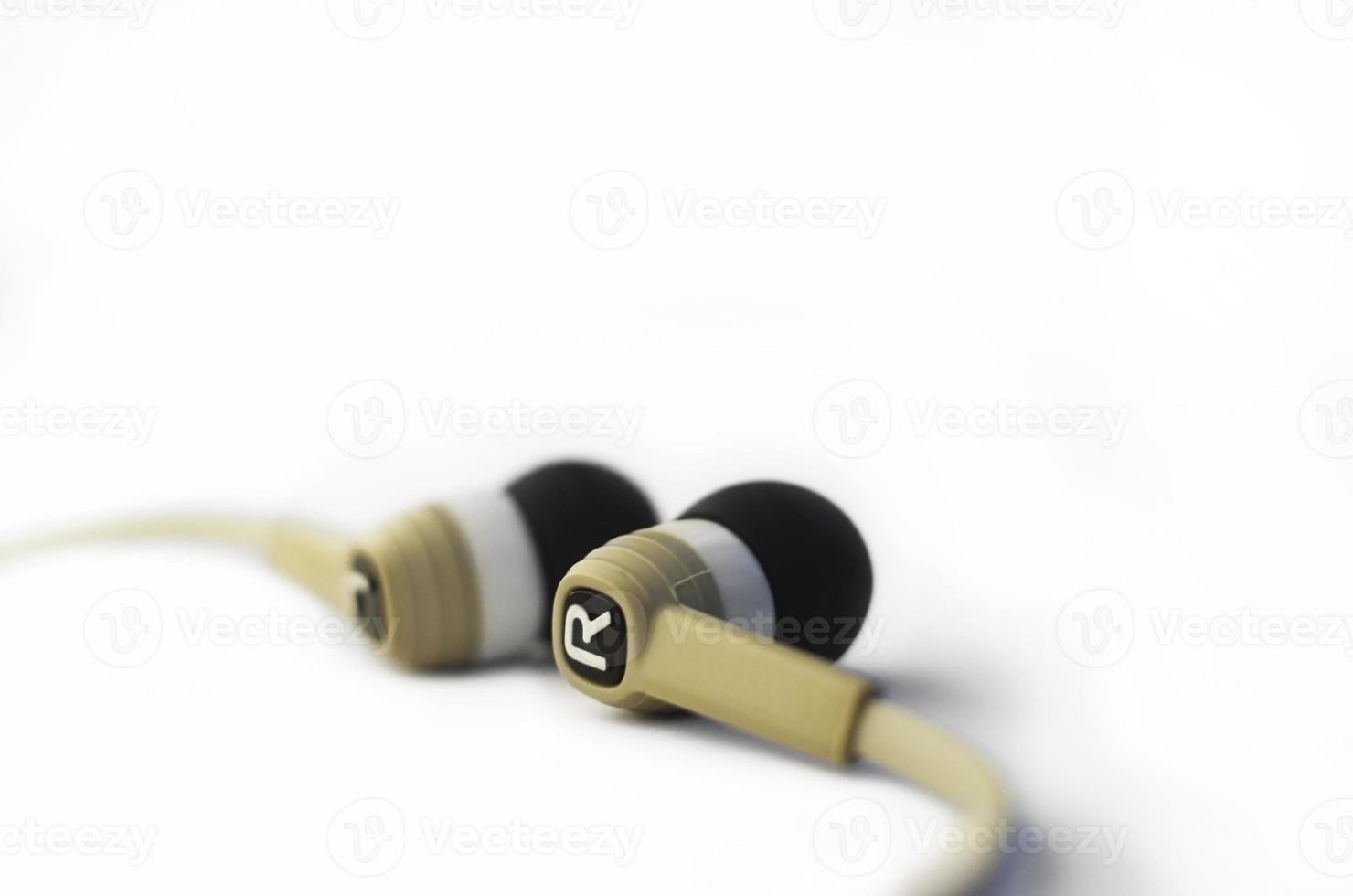 Earphones isolated on white photo