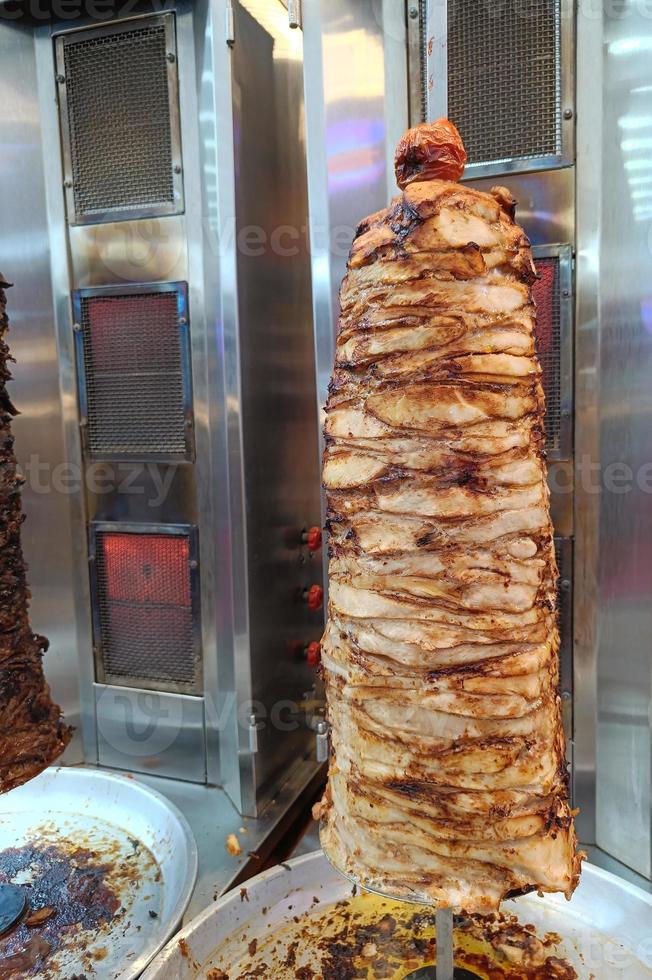 Hot grilled meat on the stove for making kebabs in the market at Thailand. popular photo