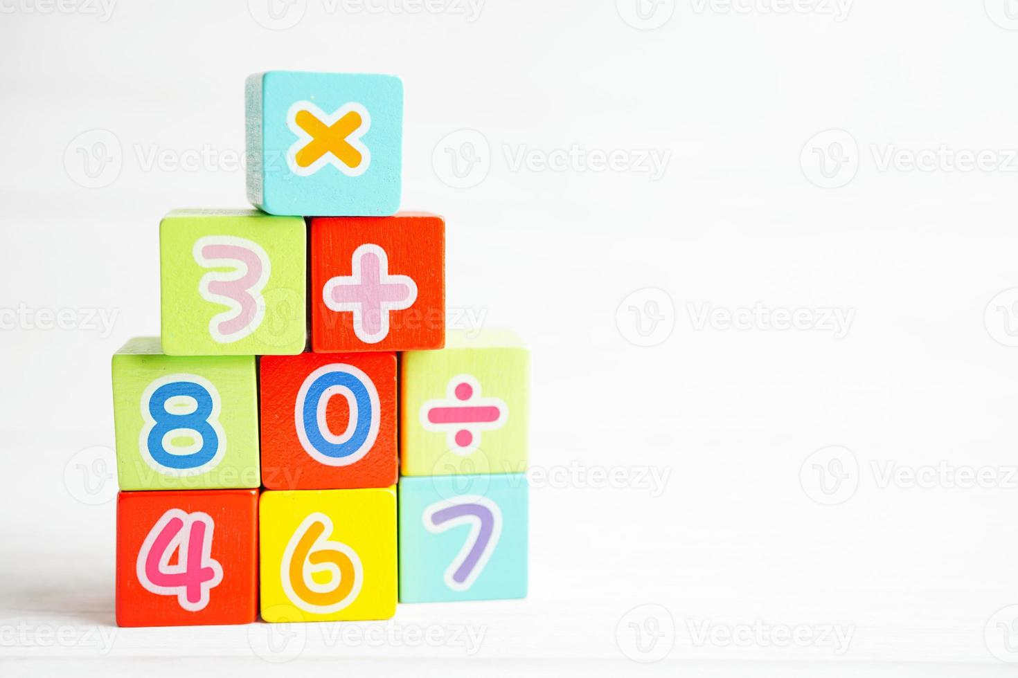 Number wood block cubes for learning Mathematic, education math concept. photo