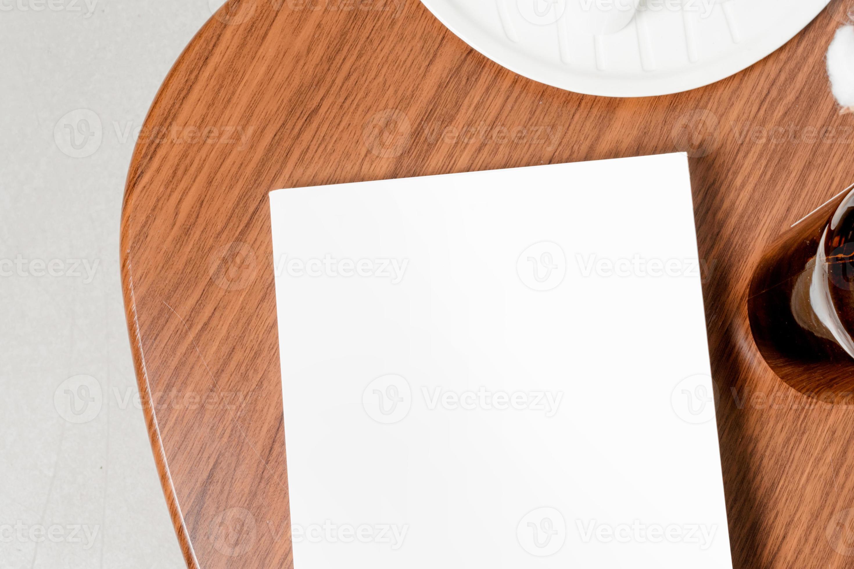 Magazine cover mockup magazine on coffee table top view 12924189 stock
