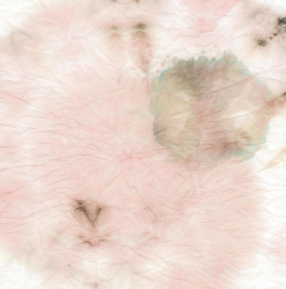 teñido anudado en espiral rosa. tela de remolino teñida. flor foto