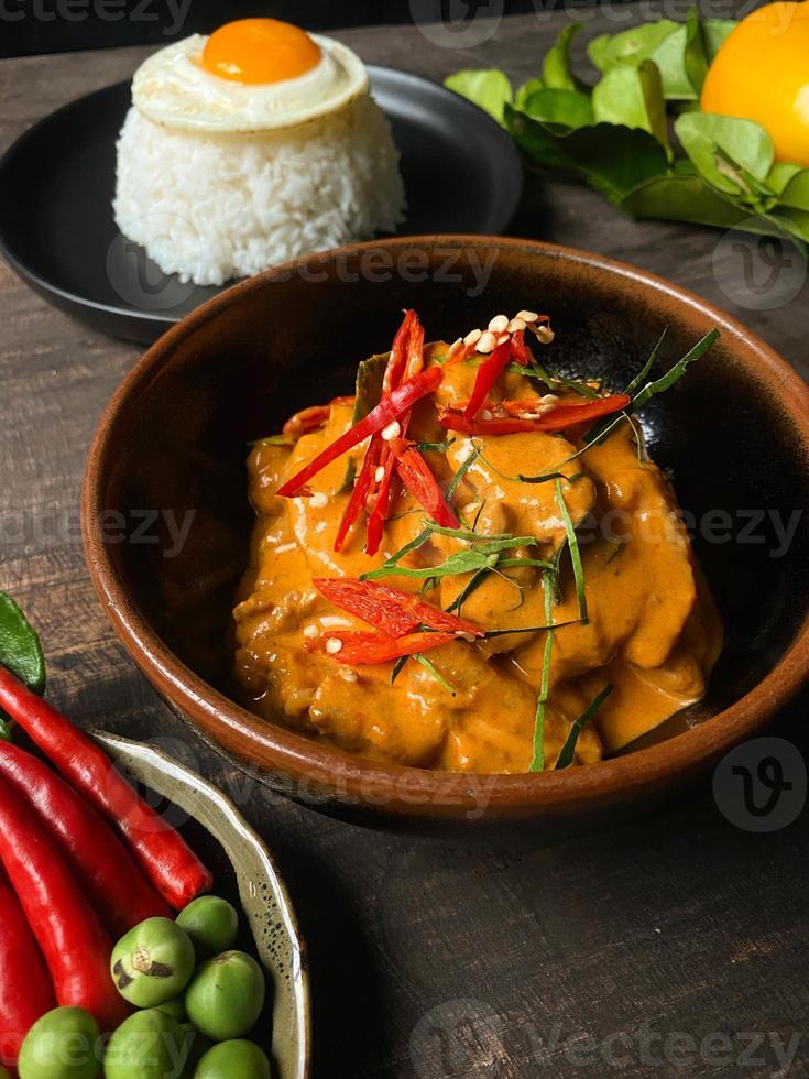 A set of Thai food on a wood table with beautiful light photo