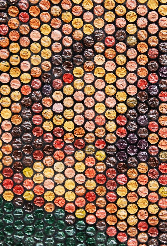Texture, background made of small stumps painted in different colors, looks like mosaic photo