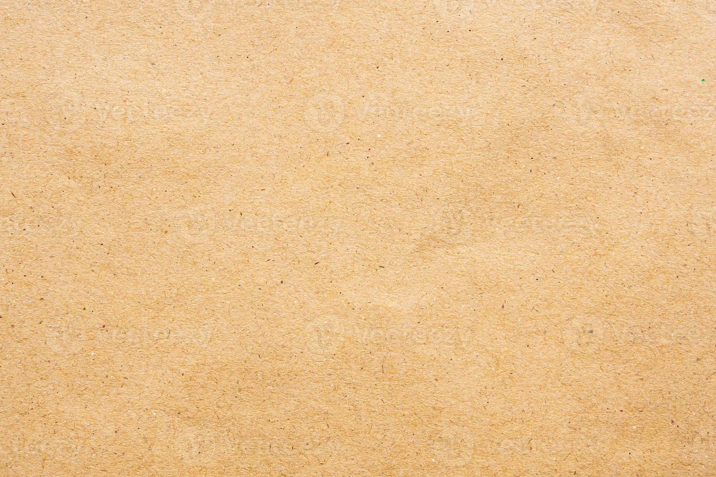 Brown eco recycled kraft paper sheet texture cardboard background photo