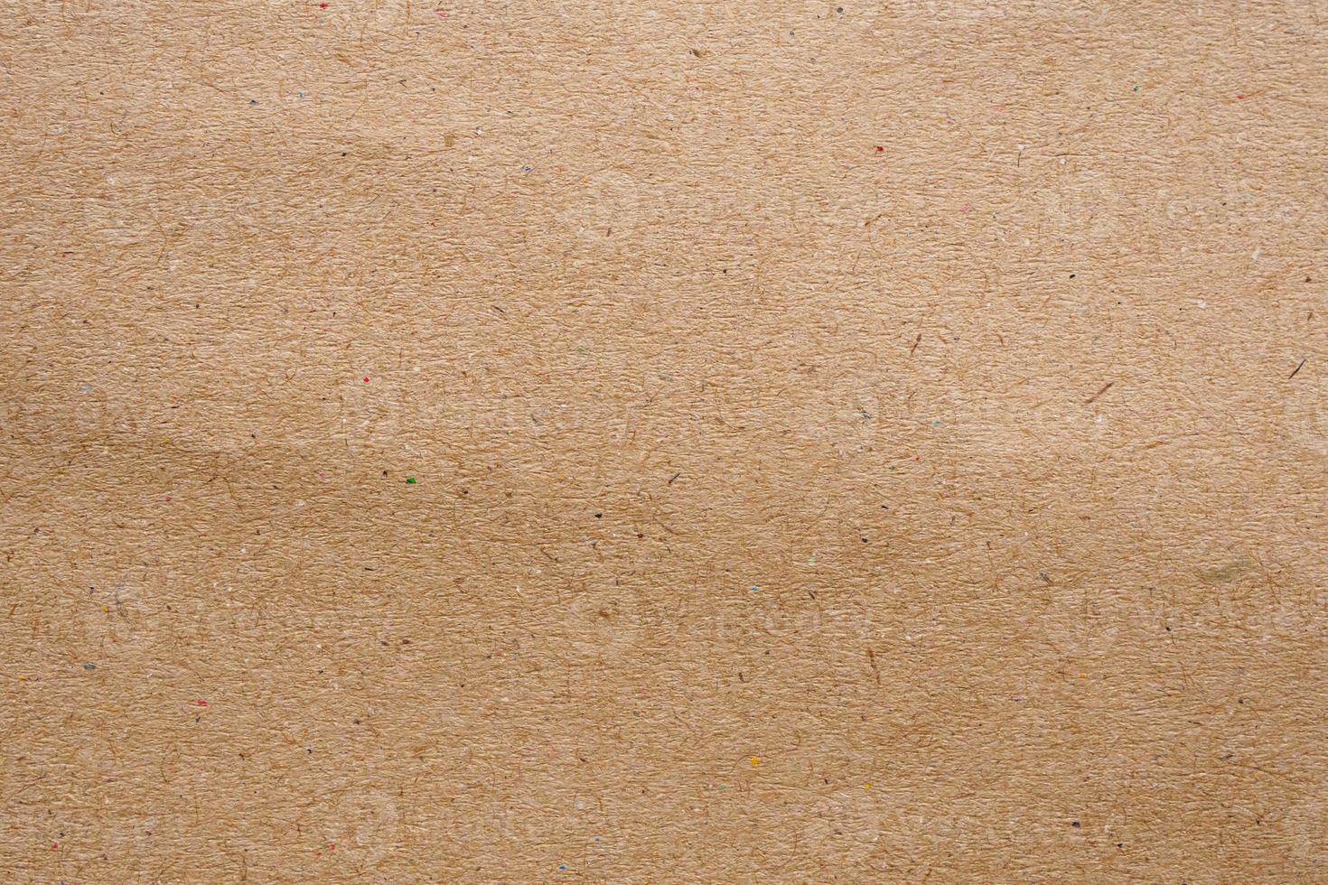 Brown paper eco recycled kraft sheet texture cardboard background photo