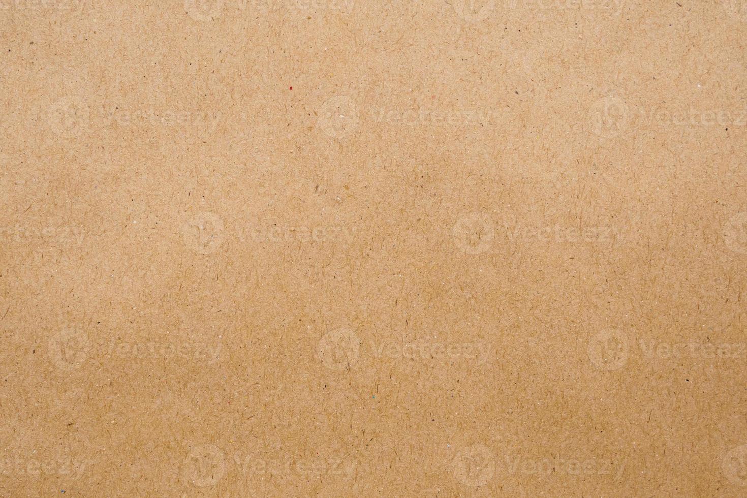Brown eco recycled kraft paper sheet texture cardboard background photo