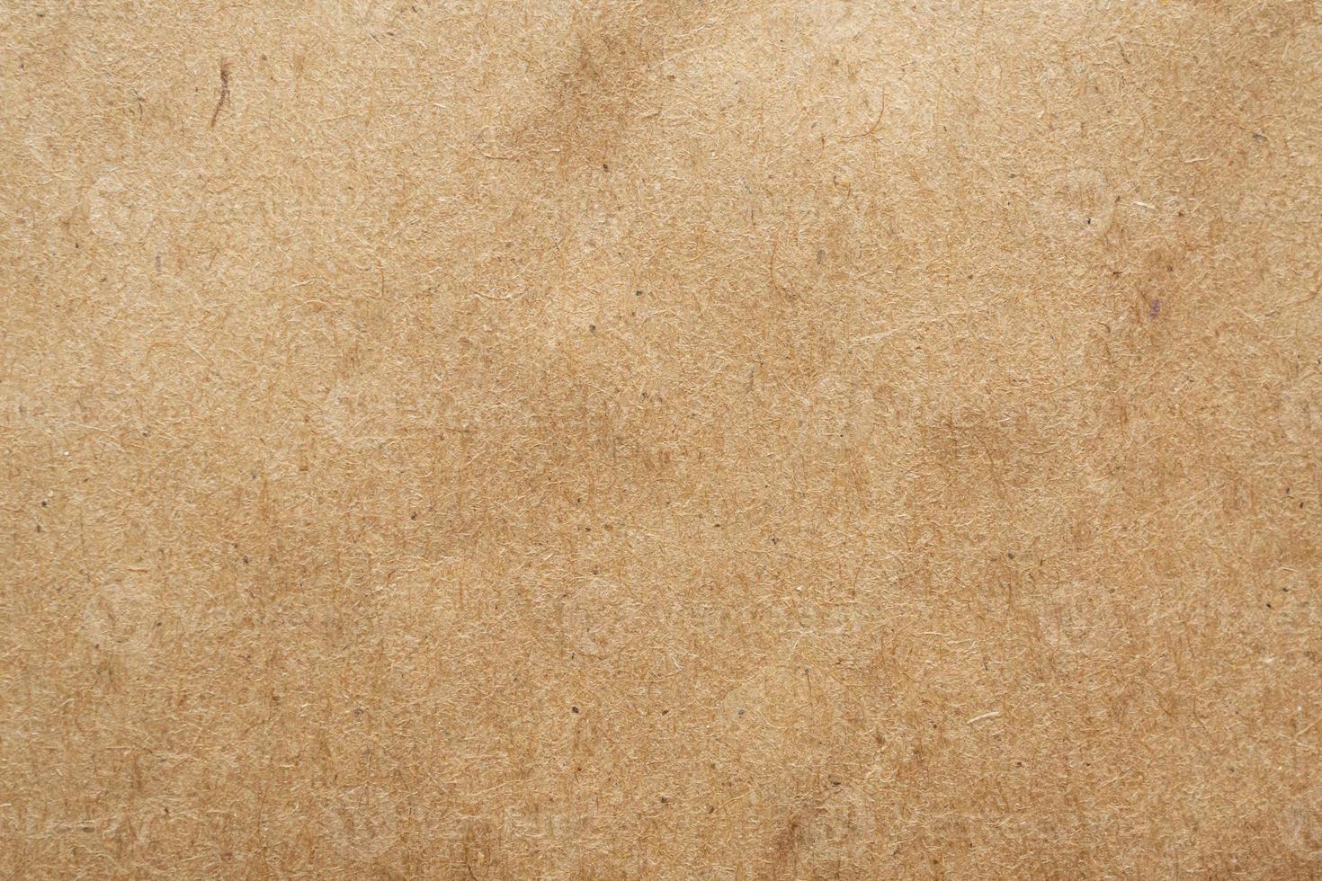 Brown eco recycled kraft paper sheet texture cardboard background photo