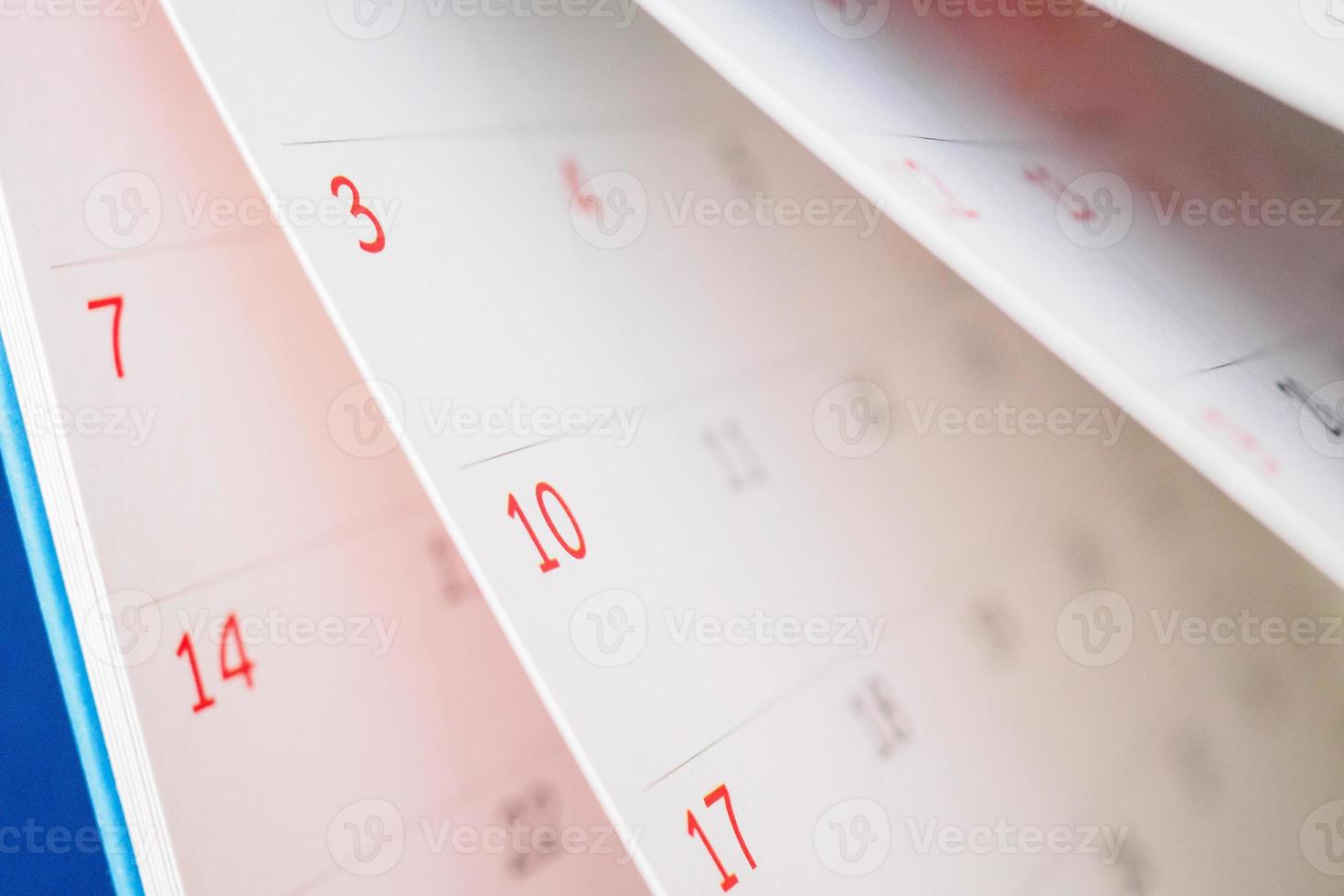 Calendar page flipping sheet close up on office table background