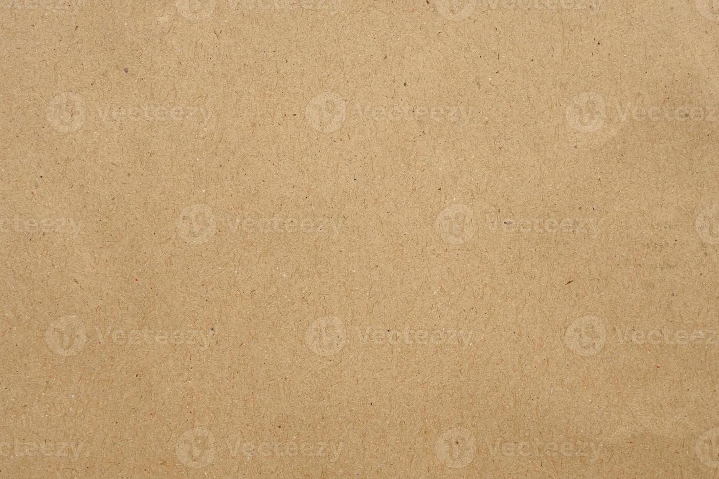 Brown eco recycled kraft paper sheet texture cardboard background photo