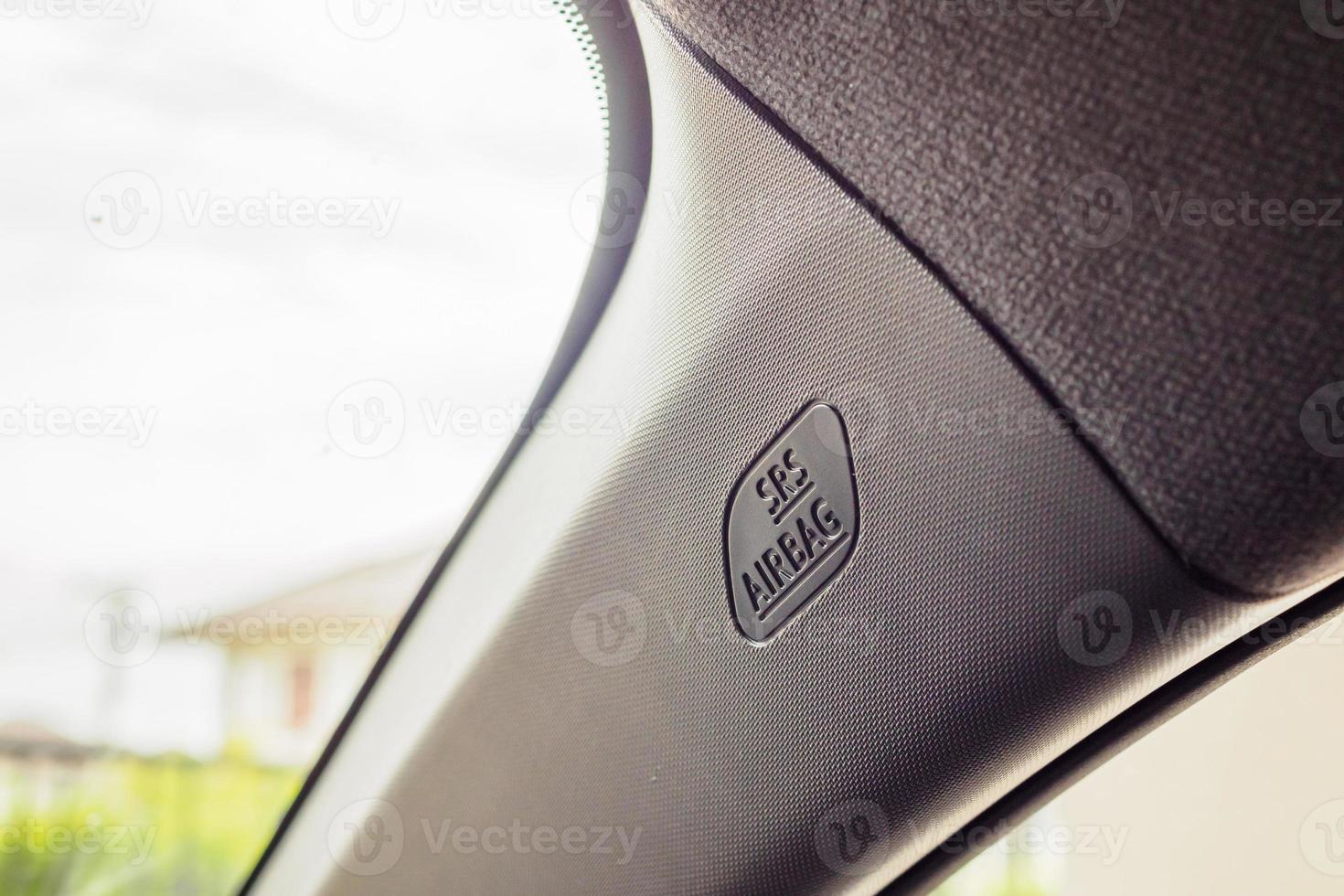 Safety side curtain airbag sign in new modern car photo