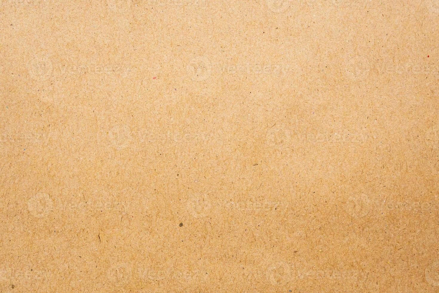 Brown eco recycled kraft paper sheet texture cardboard background photo