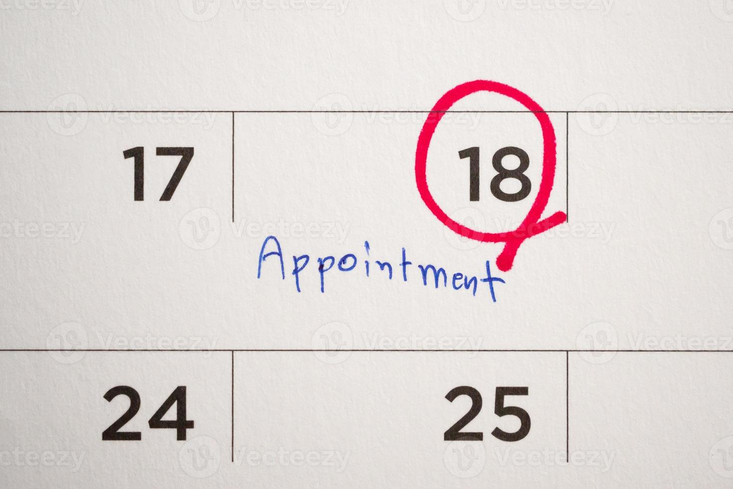 important appointment schedule write on white calendar page date close up photo