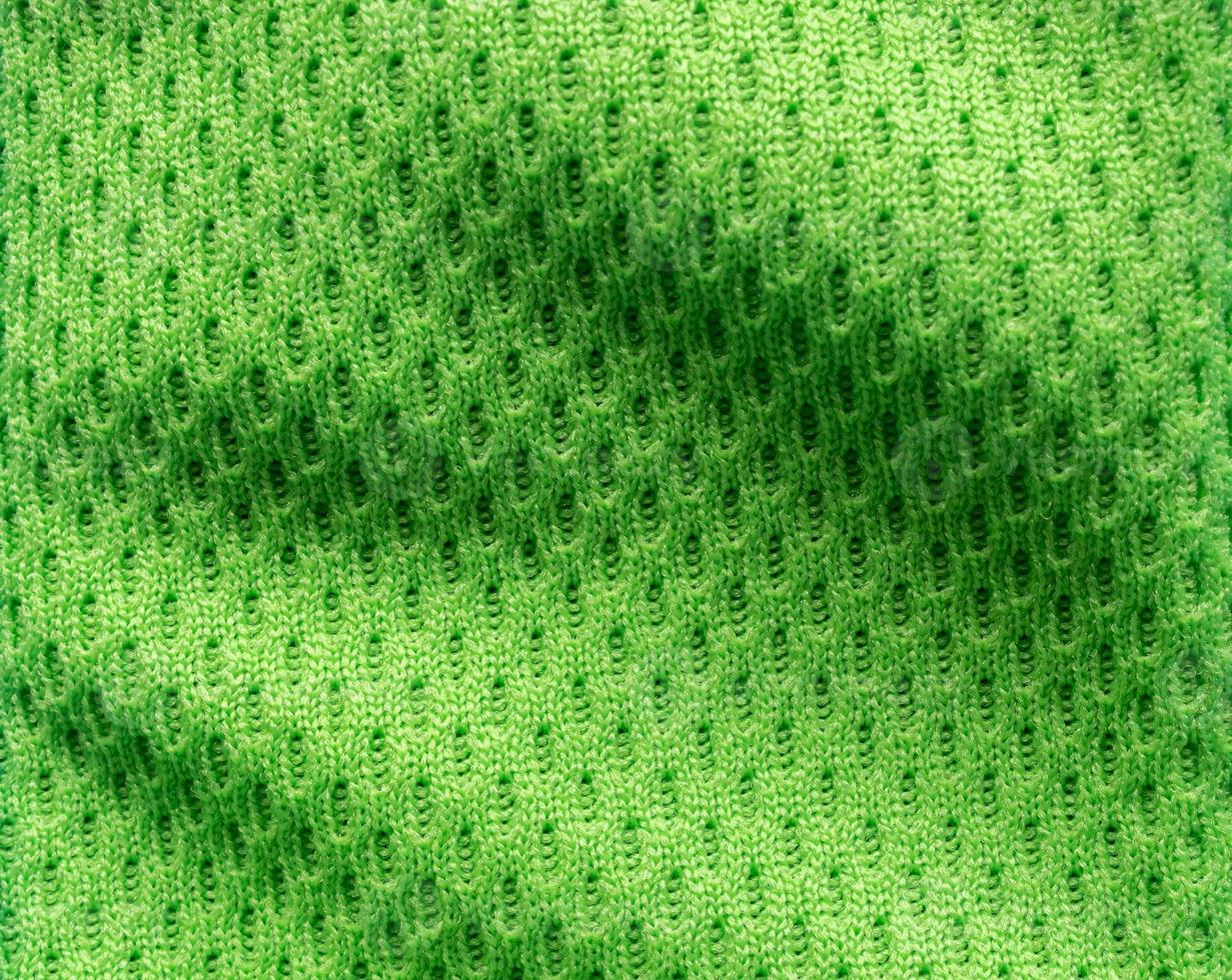 ropa deportiva verde tela camiseta de fútbol jersey textura cerrar foto