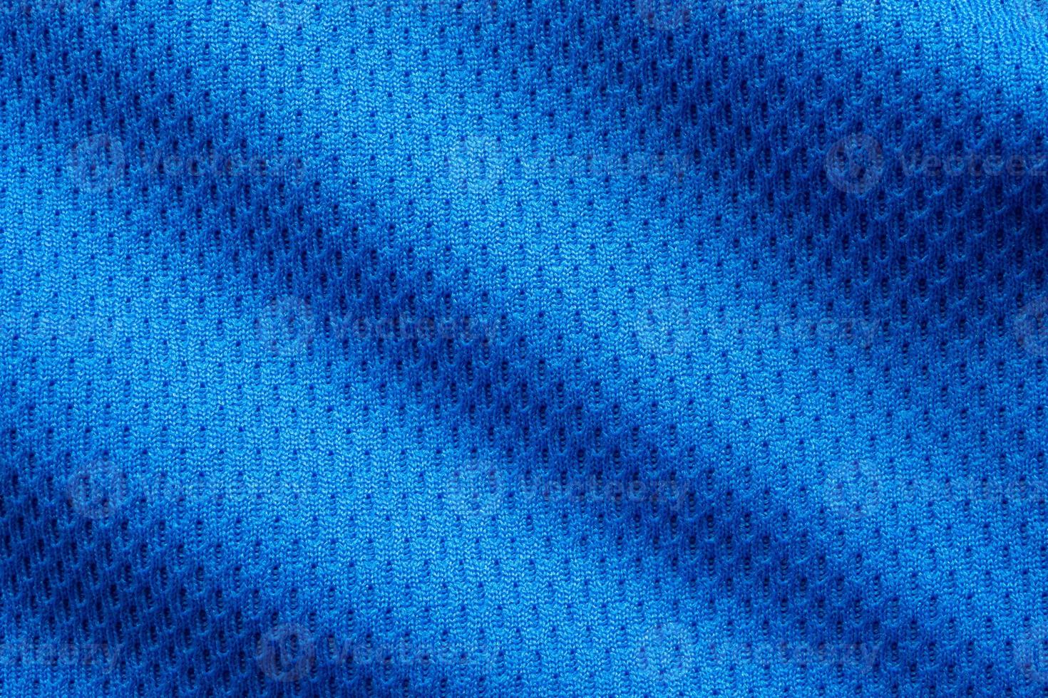 Blue sports clothing fabric football shirt jersey texture close up photo