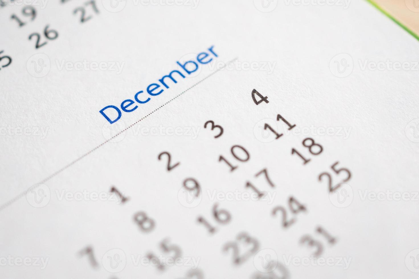 December calendar page with months and dates business planning appointment meeting concept photo