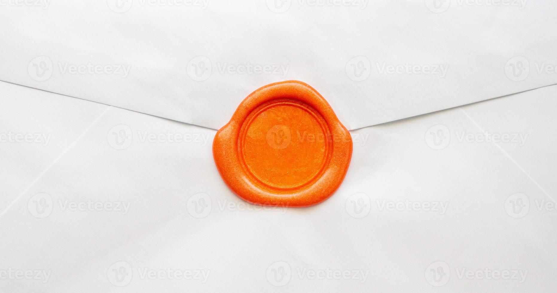 Wax seal stamp on white letter paper background photo