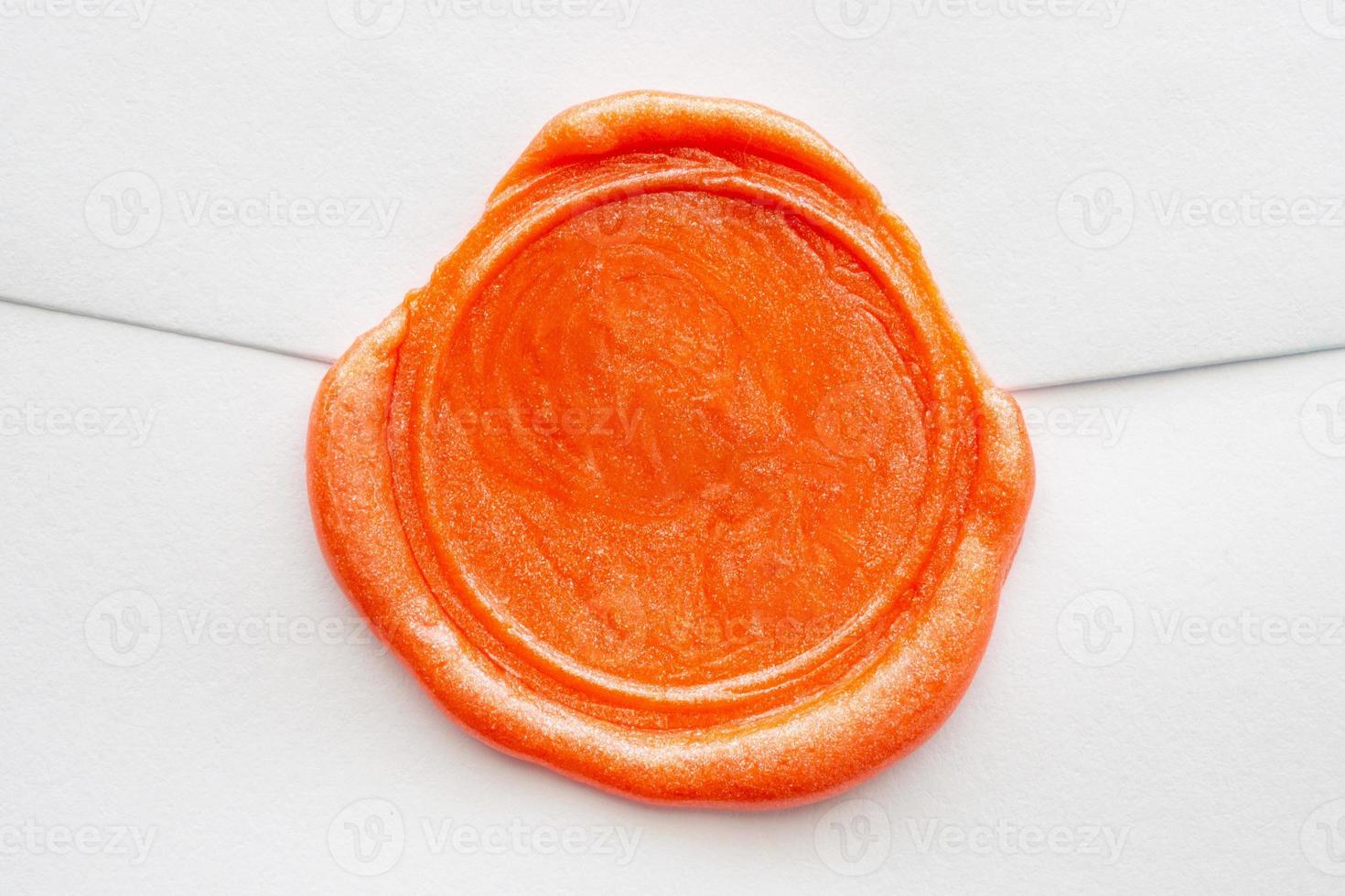 Wax seal stamp on white letter paper background photo