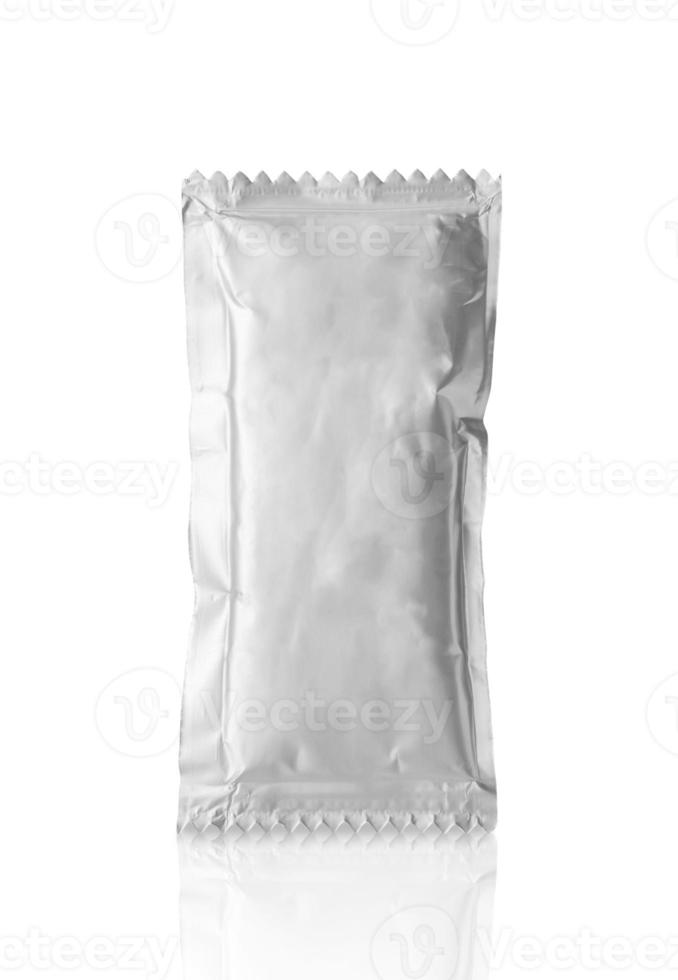 Blank silver foil tomato ketchup sauce sachet package isolated on white background photo