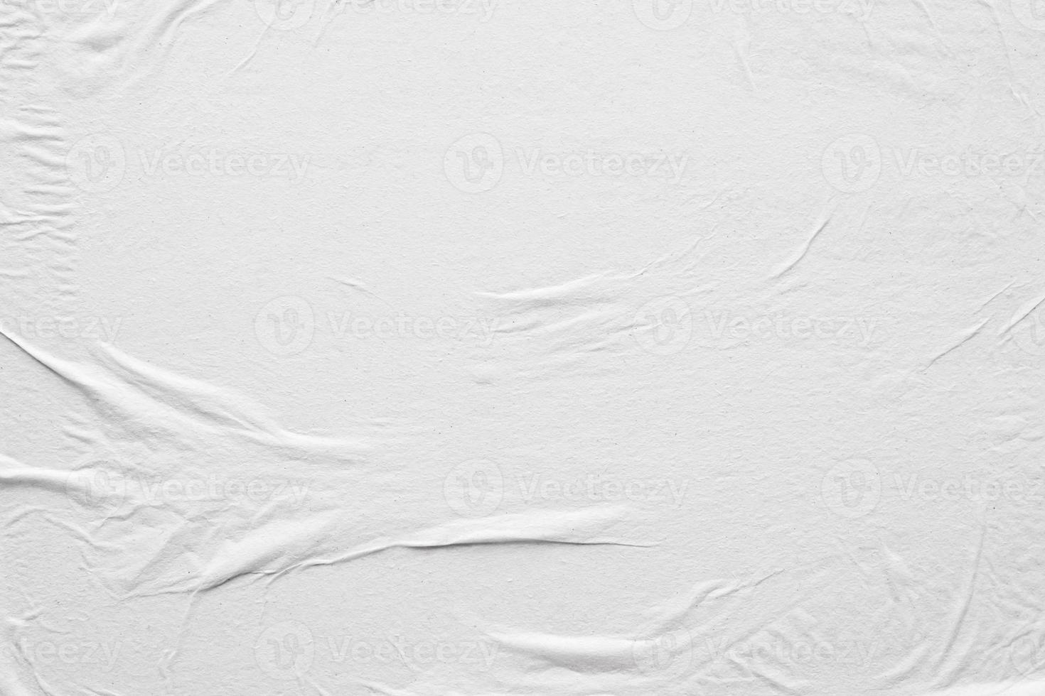 Blank white crumpled and creased paper poster texture background